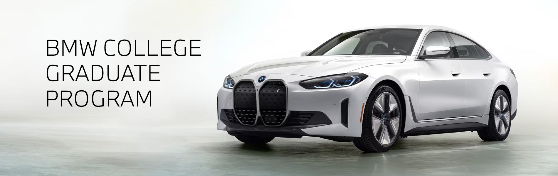White BMW i4 parked. BMW College Graduate Program. | BMW of Pittsburgh in Pittsburgh PA