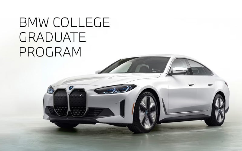 White BMW i4 parked. BMW College Graduate Program. | BMW of Pittsburgh in Pittsburgh PA